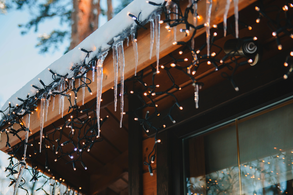 Christmas,Garland,Lights,And,Icicles,On,The,Porch.,New,Year